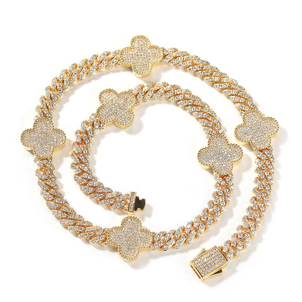 Gold bracelet with diamond accents on a white background